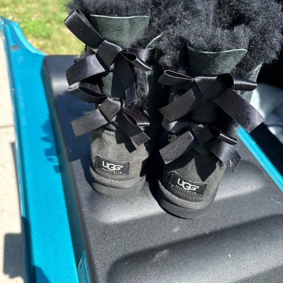 Black and tan Ugg bow boots both 75$ will work with price - Picture 1 of 2